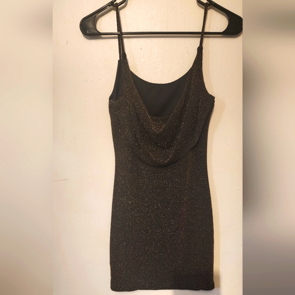 Black and Gold size small short mini dress Excellent condition